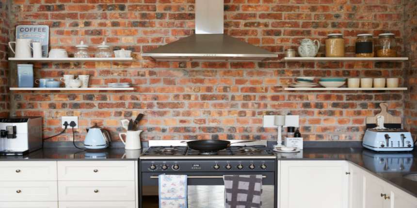 Use the exposed brick wall to display décor elements