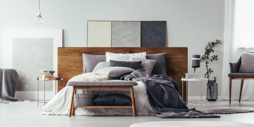 An All-White Bedroom with Just a Wood-Finished Bed