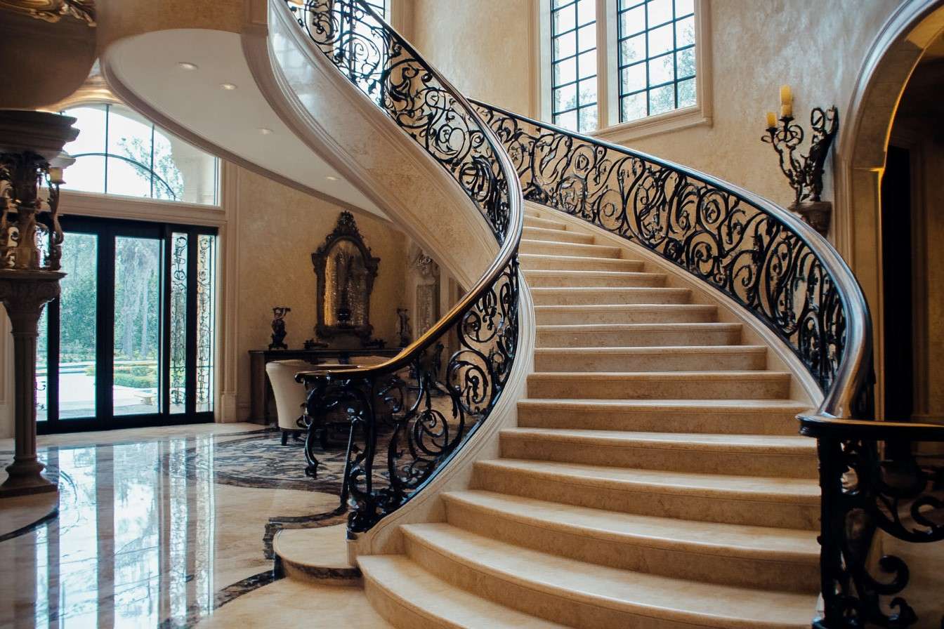 Front Staircase with Spiral Railing Design